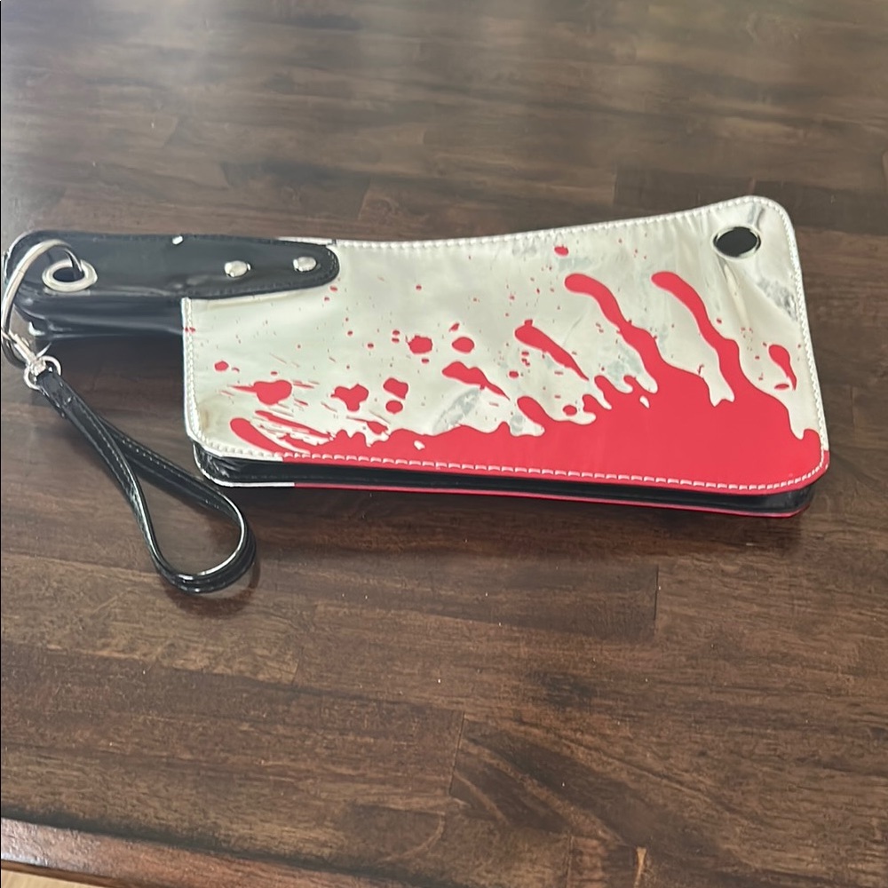 LAST CHANCE OFFER: 
Kreepsville Cleaver Red and metallic Wristlet Clutch